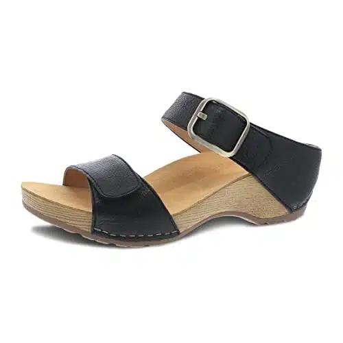 Dansko Tanya Slip On Wedge Sandal for Women  Cushioned, Contoured Footbed for All Day Comfort and Support  Hook & Loop Strap with Buckle Detail  Lightweight Rubber Outsole Tanya Black  US